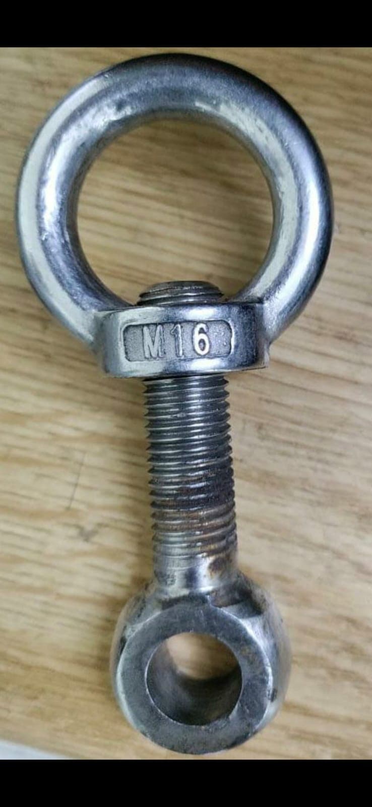 Metallic hardware on a workbench